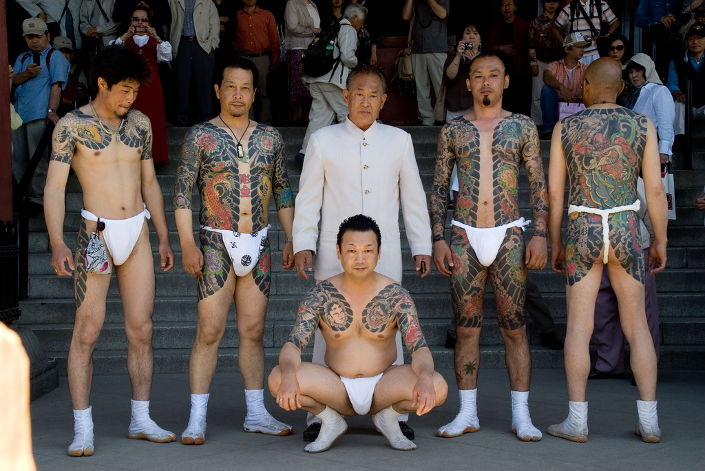 Japanese Yakuza ‘peacocking’ at a festival in Tokyo in May 2007. Photograph: Jorge from Tokyo, Japan/Wikipedia. 