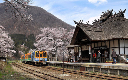 Aizu Railway's Yunokami-Onsen Station in Fukushima Prefecture. The station has a footbath onsen, hot spring, and a sunken fireplace making it popular amongst railway enthusiasts. Image: Wikipedia.